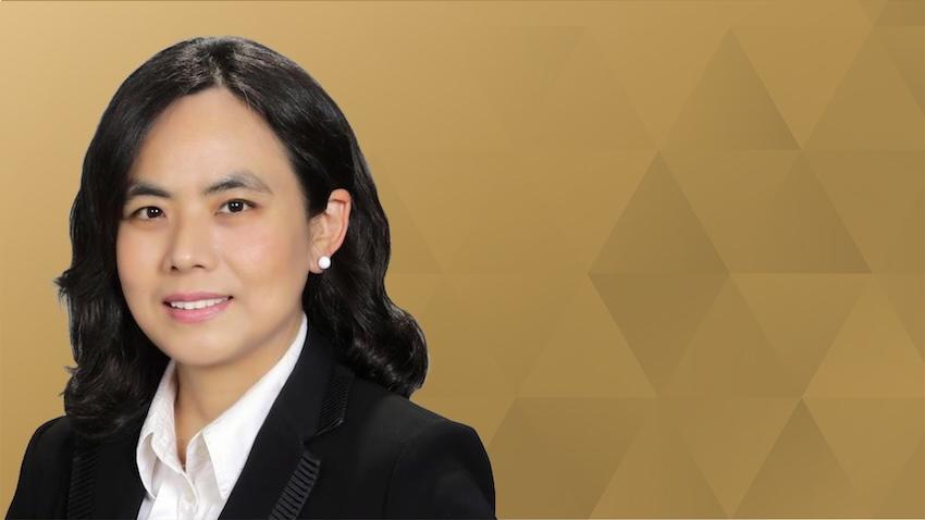 Woman headshot over gold background